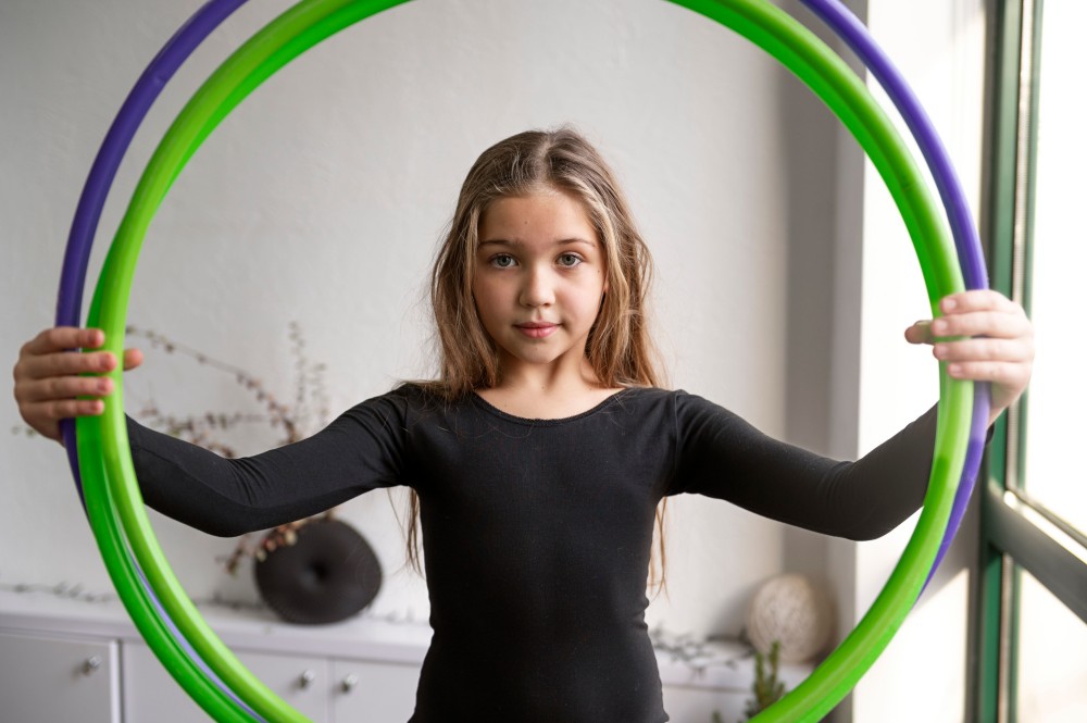 beautiful-young-girl-using-hula-hop.jpg