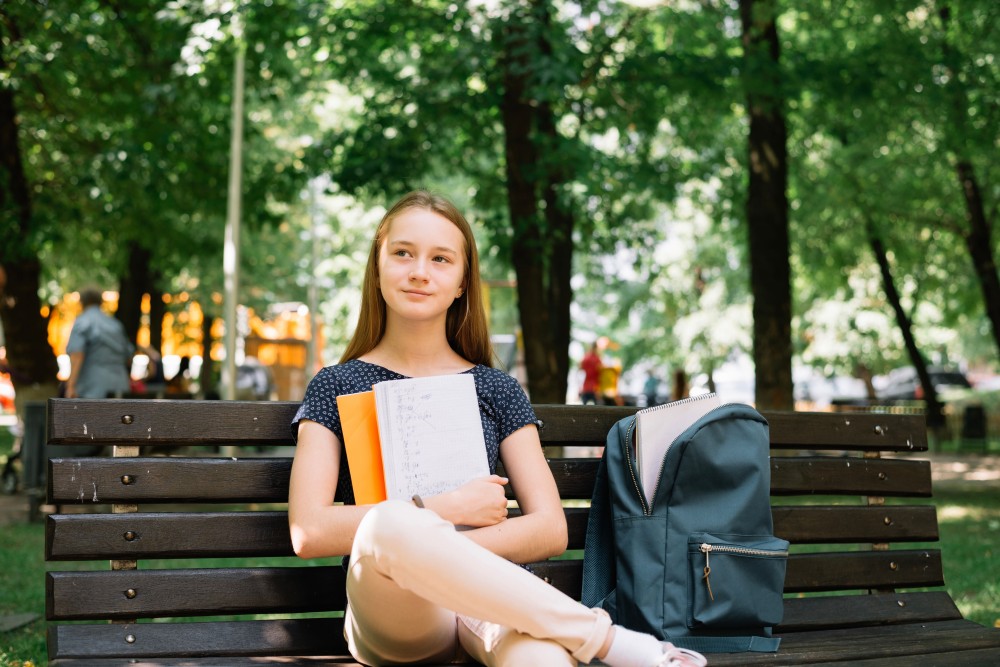 charming-student-daydreaming-bench.jpg